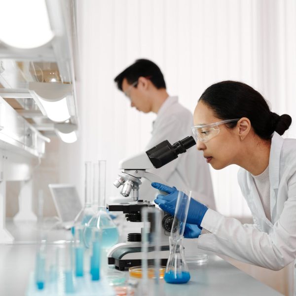 Woman Using the Microscope